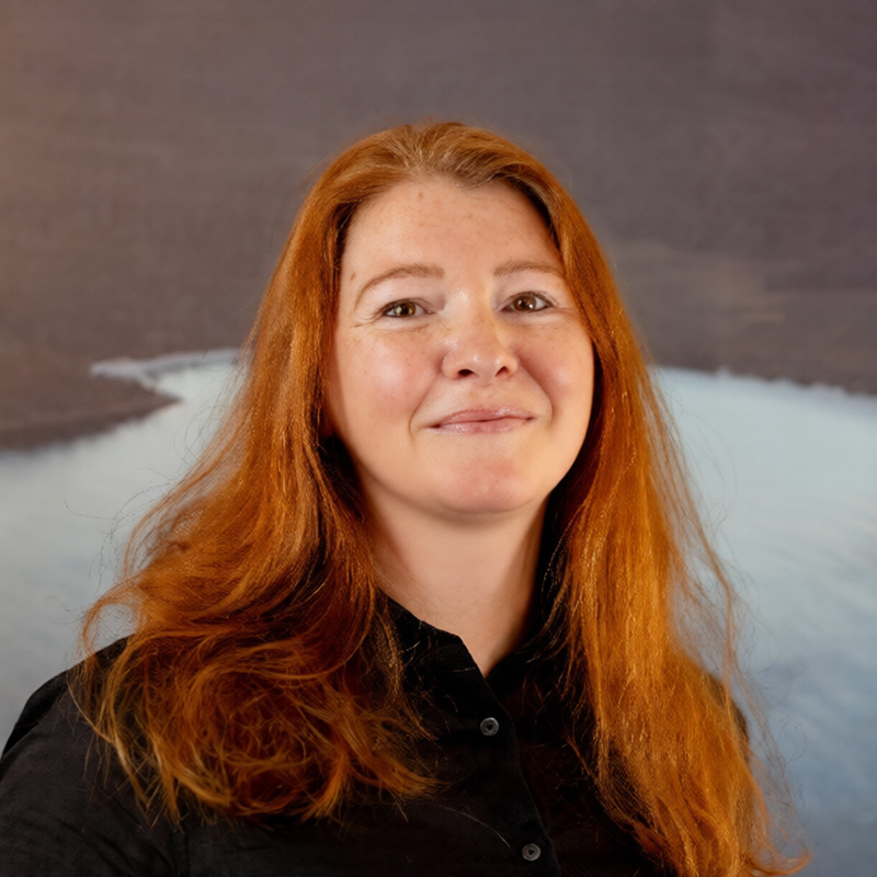 Professional headshot of Elinor Sheargold.