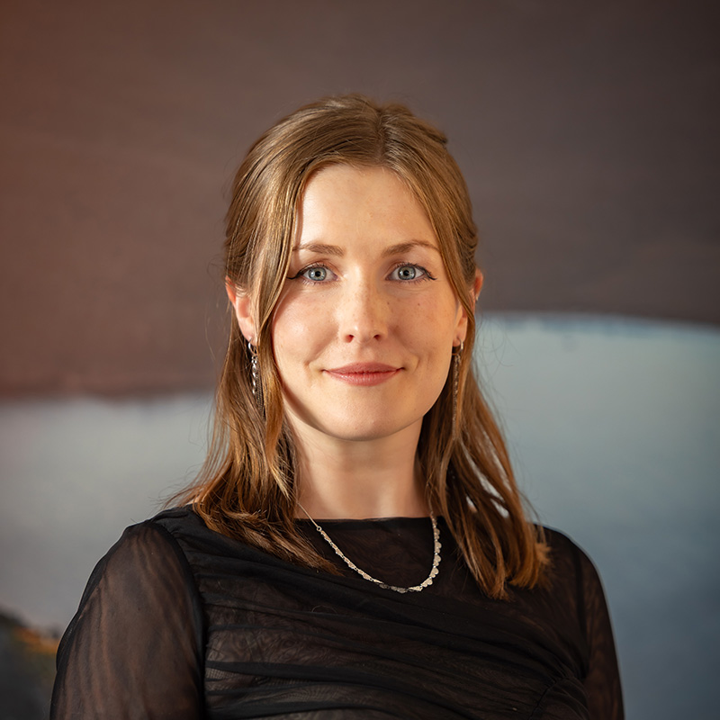 Professional headshot of Annie McCann.