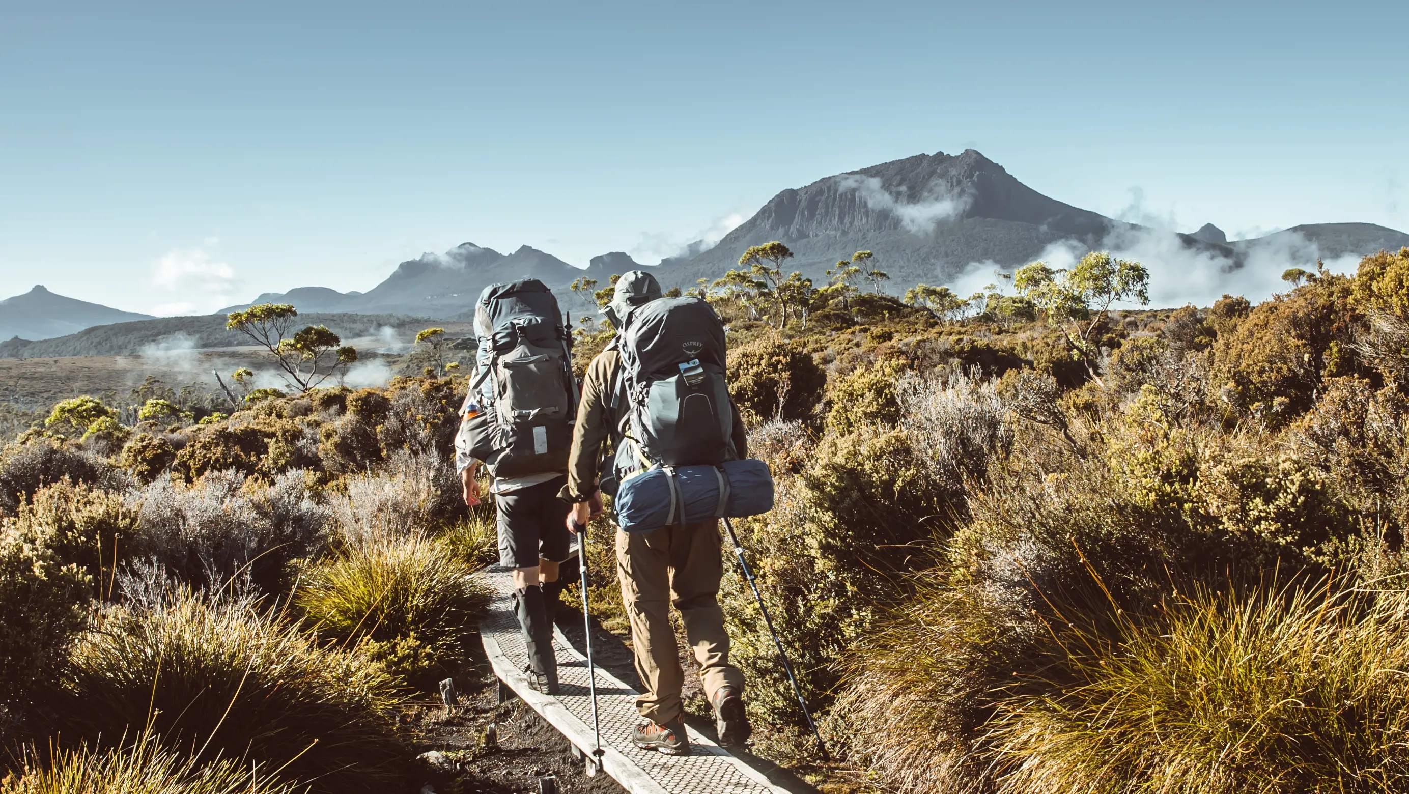 "Hikers walking the Overland Track at Cradle Mountain, Lake St Clair National Park "