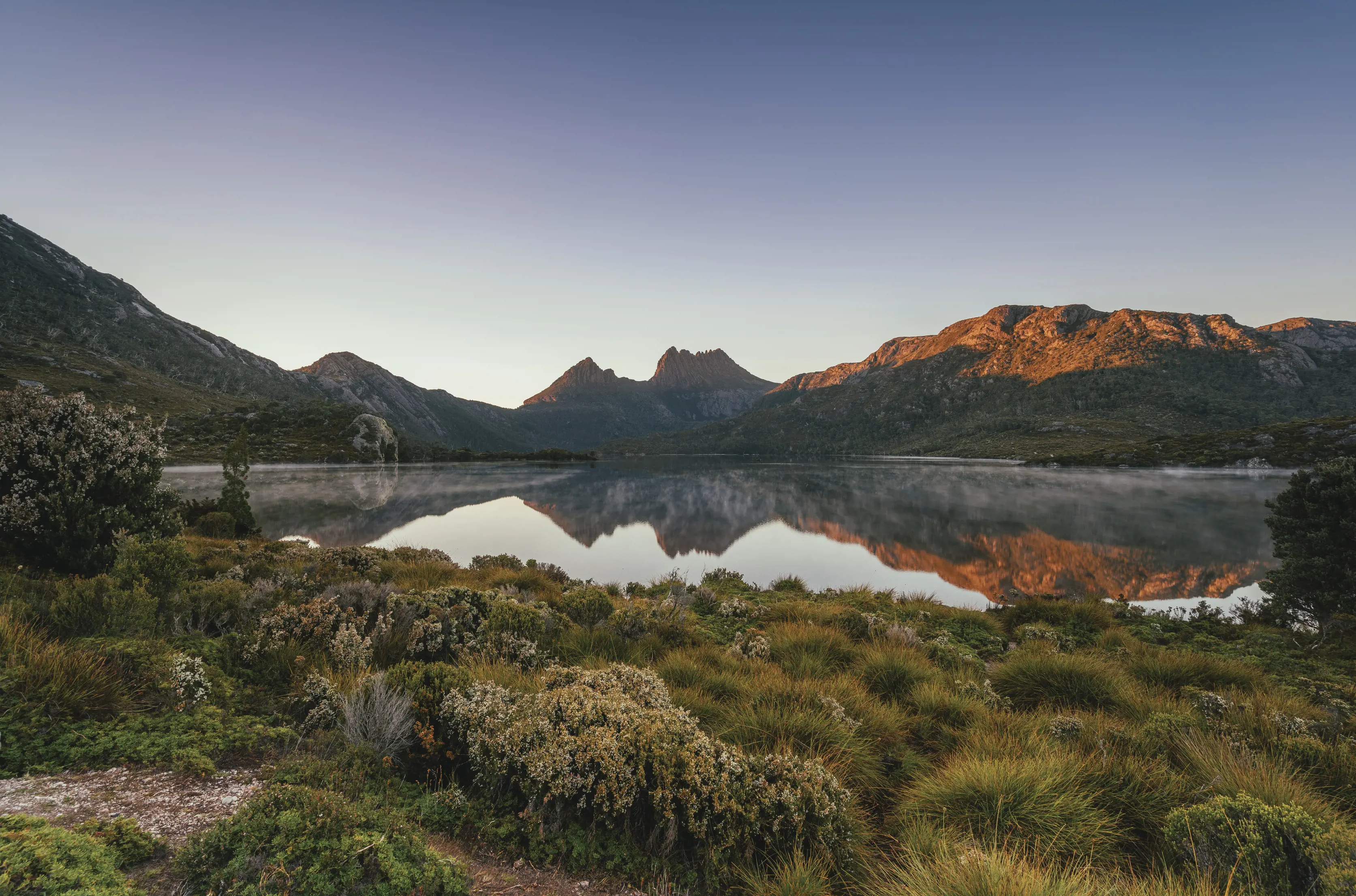 View of Cradle Mountain across the glassy Dove Lake.