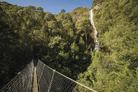 Wide of Montezuma Falls, Tasmania's highest waterfall, taken from the nearby bridge.