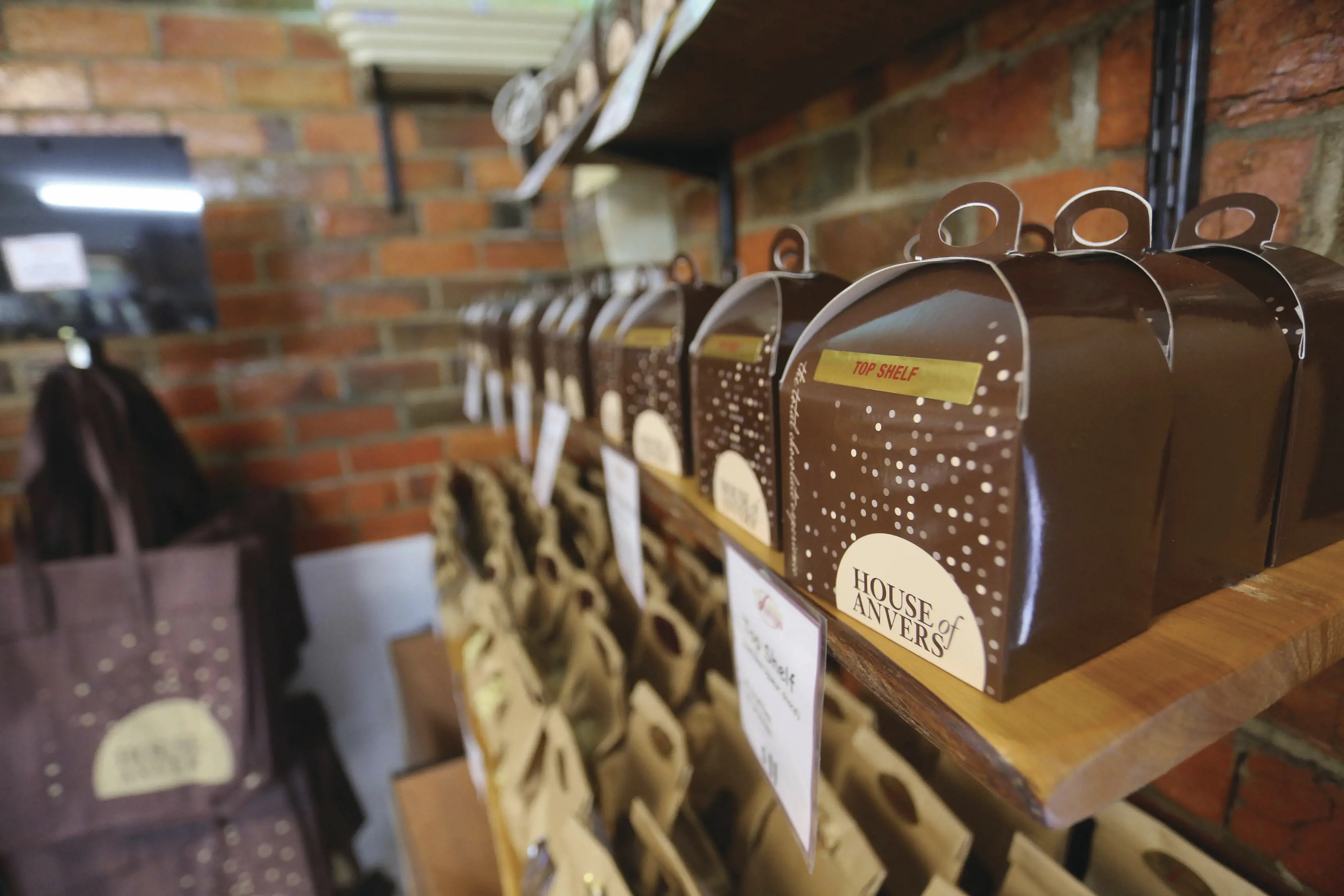 Packaged chocolate on shelf at The House of Anvers, cafe, shop and tasting centre. 