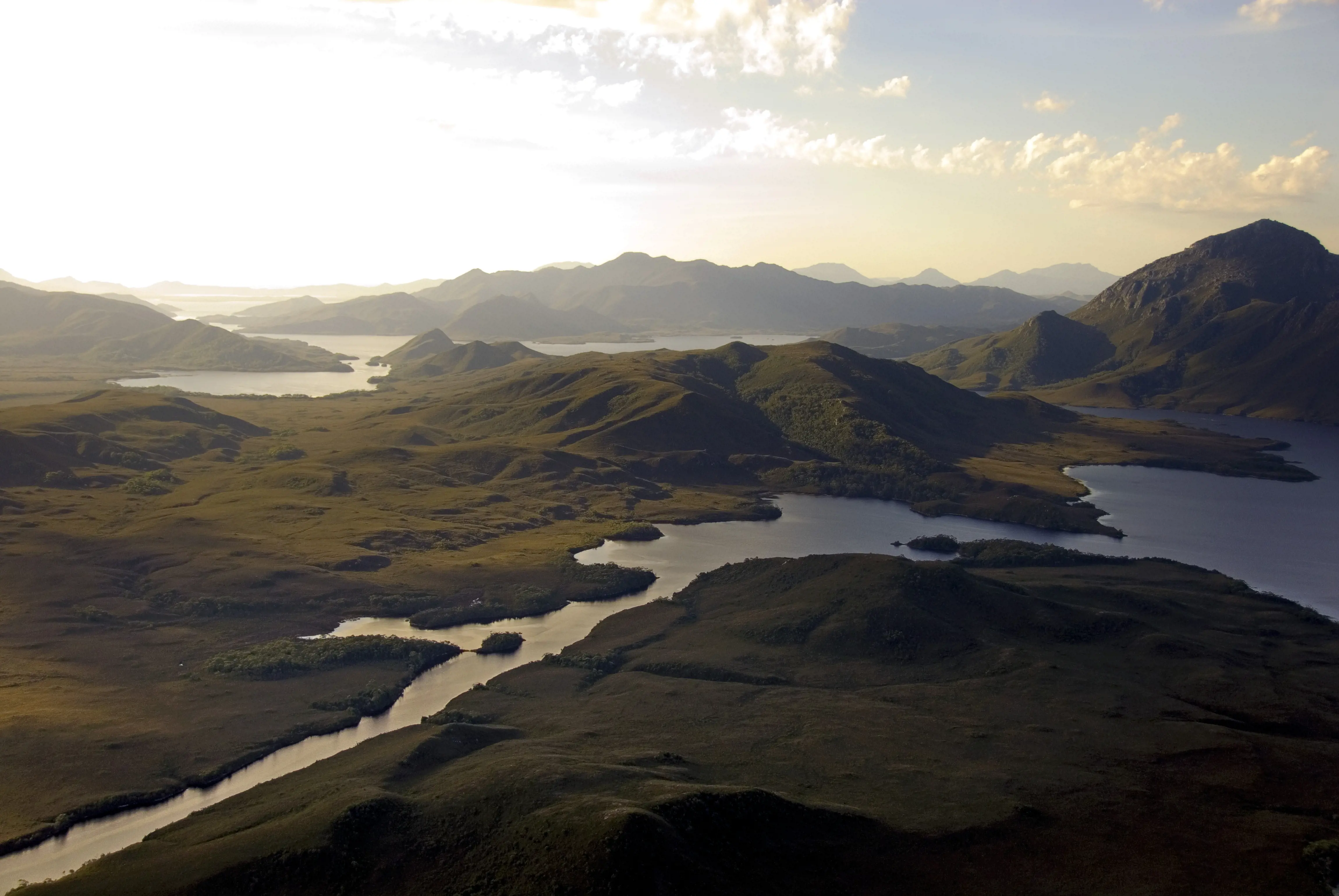 The Port Davey region of South west Tasmania. Landscape image of the rivers, quartzite peaks and extensive waterways.