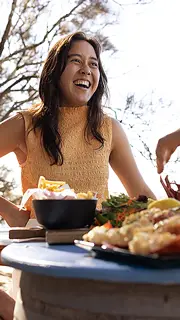 Woman smiling with seafood