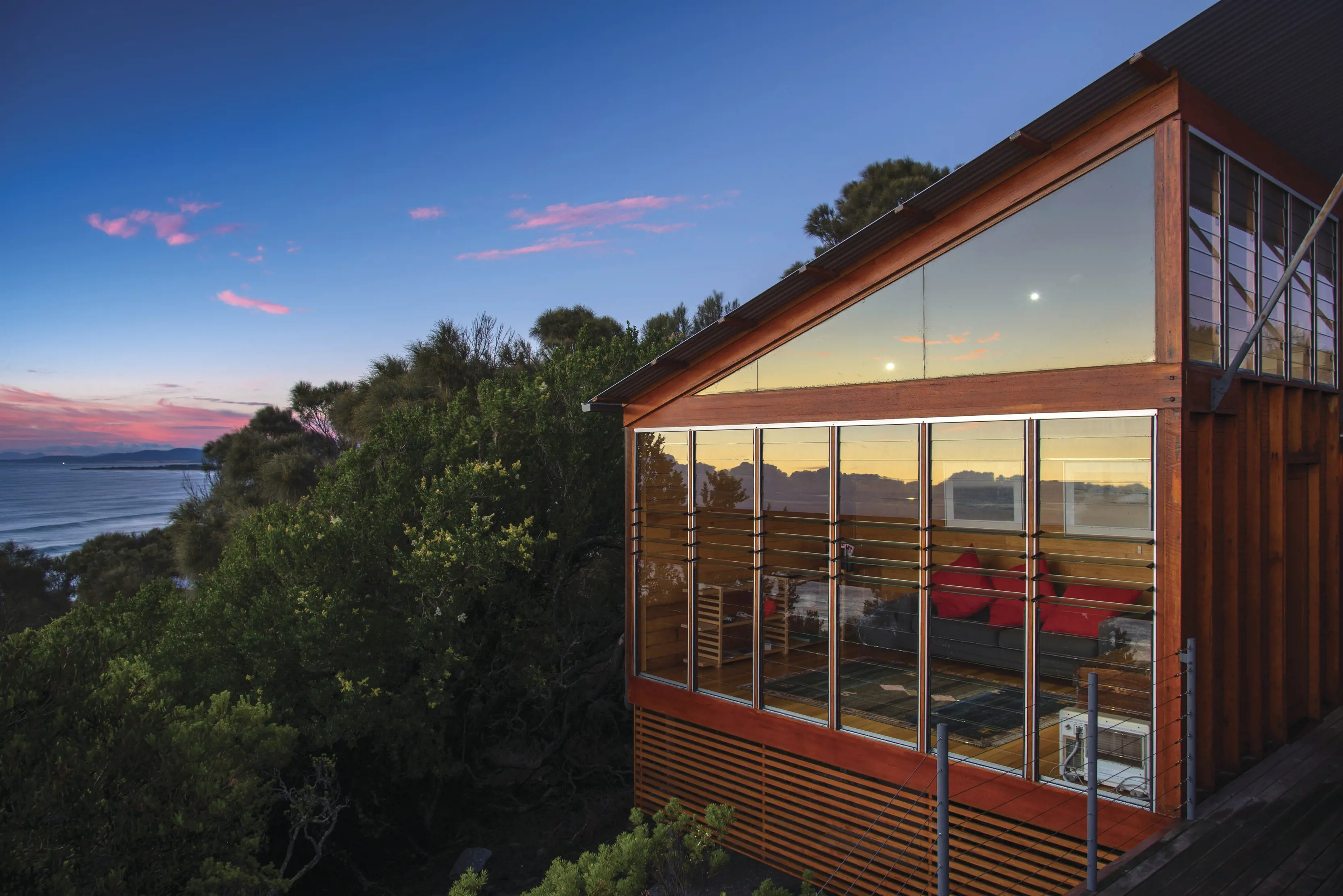 Looking at the Bay Of Fires Lodge with the sea in the distance. The Lodge is located in Mount William National Park in the north-east of Tasmania.