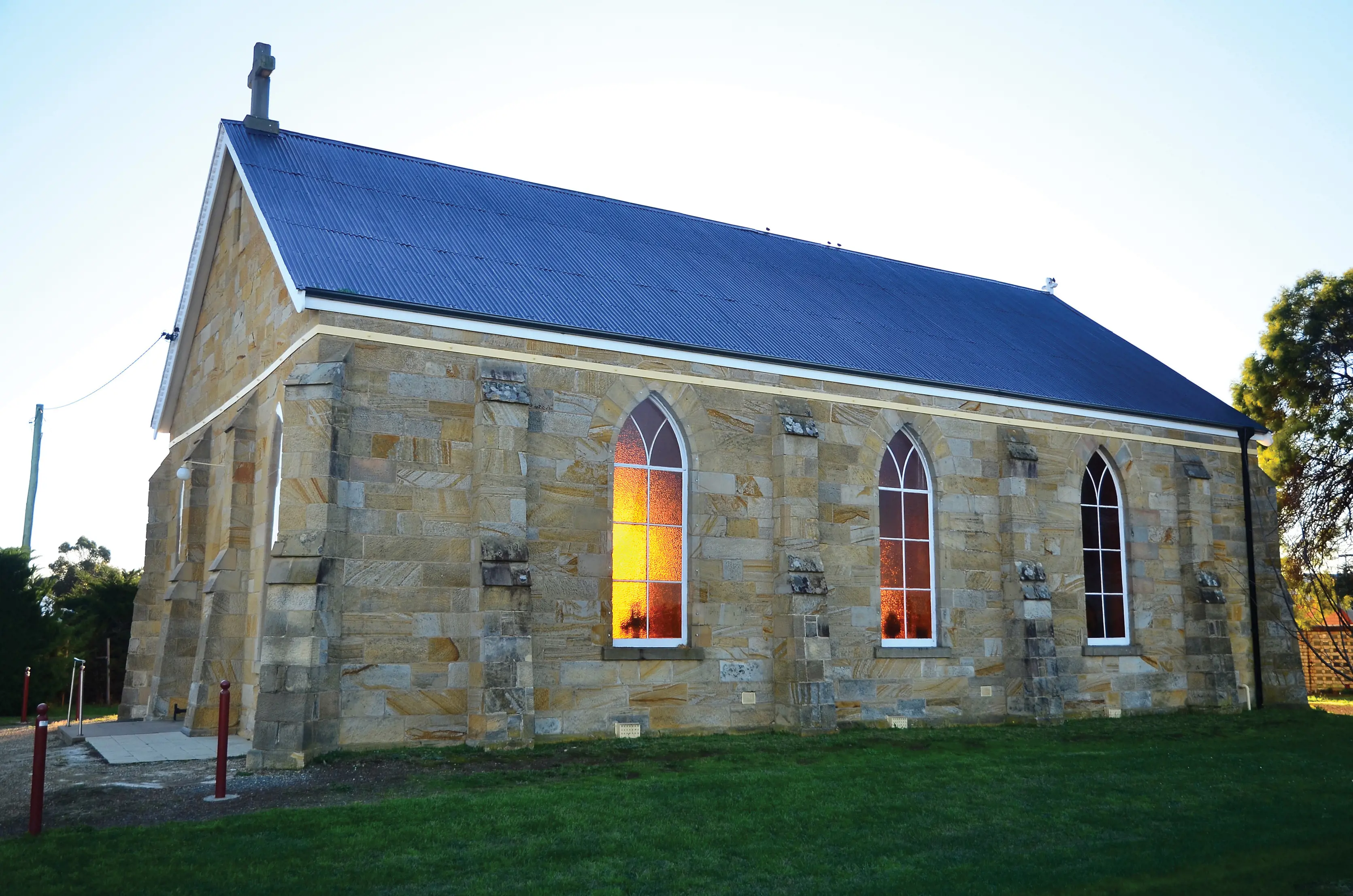 Exterior image with light beaming from inside St Georges Church, Kempton.