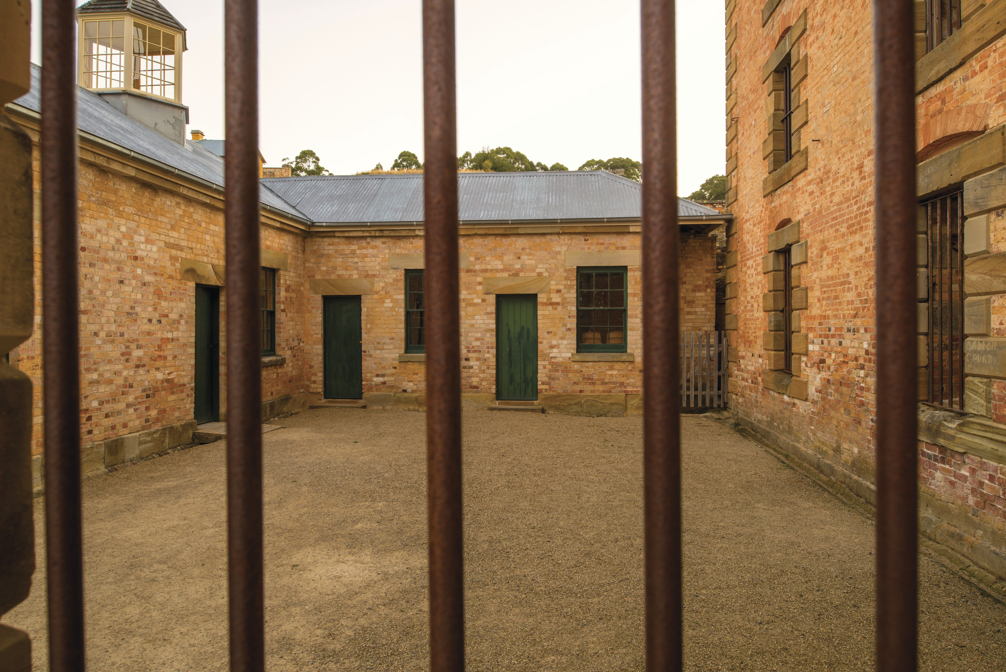 The penitentiary at Port Arthur Historic Site, taken from the point of view of behind the railings.
