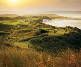 Golfers play at Barnbougle golf course, set on 200 acres of undulating coastal dunes.