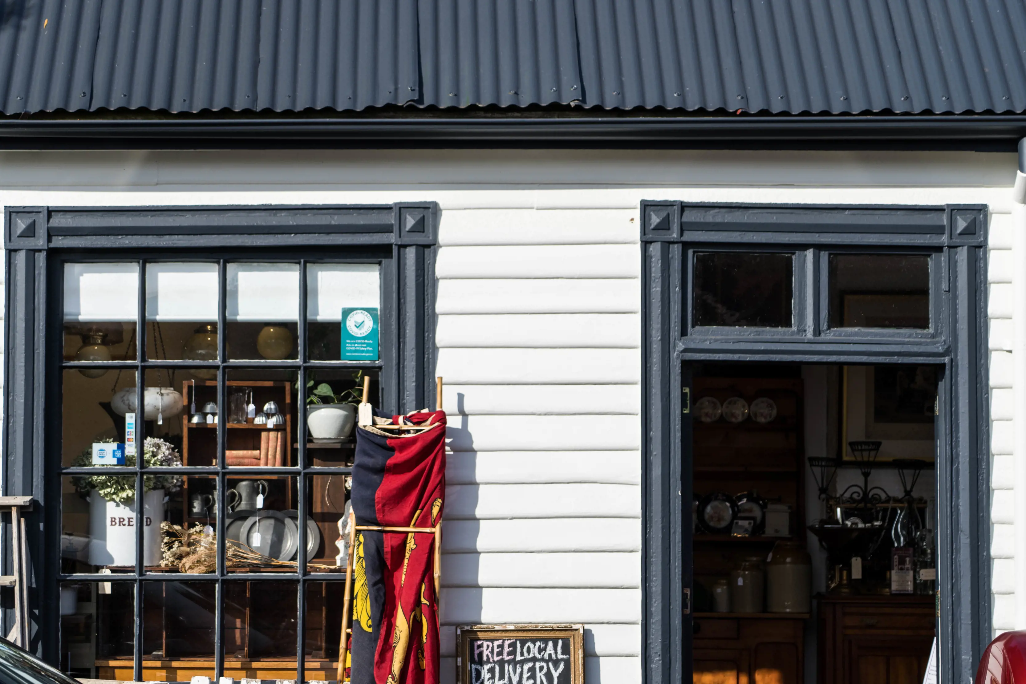 Exterior image of Anteiku Antiques, some antiques are placed outside the shop front.