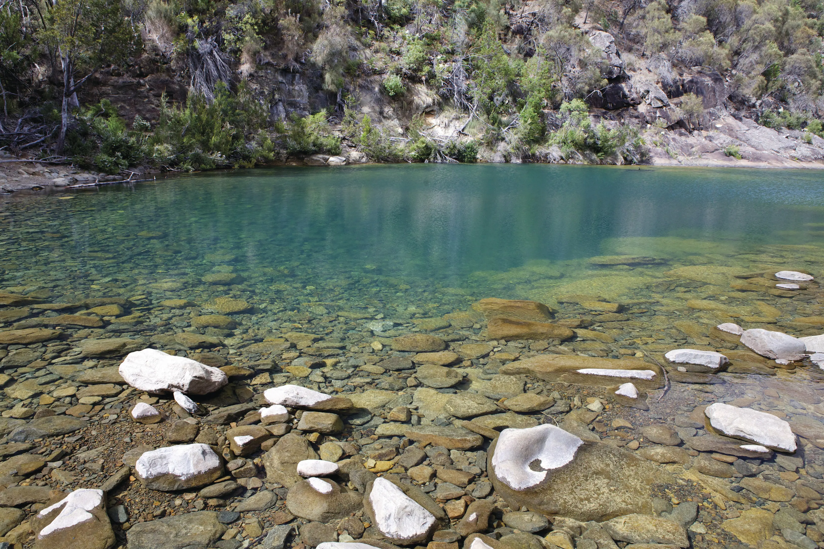 Stunning image of the Apsley River Waterhole and Gorge, with tranquil pools and undisturbed river scenes.