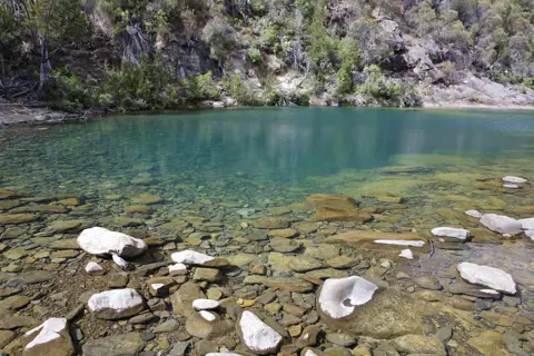 Stunning image of the Apsley River Waterhole and Gorge, with tranquil pools and undisturbed river scenes.