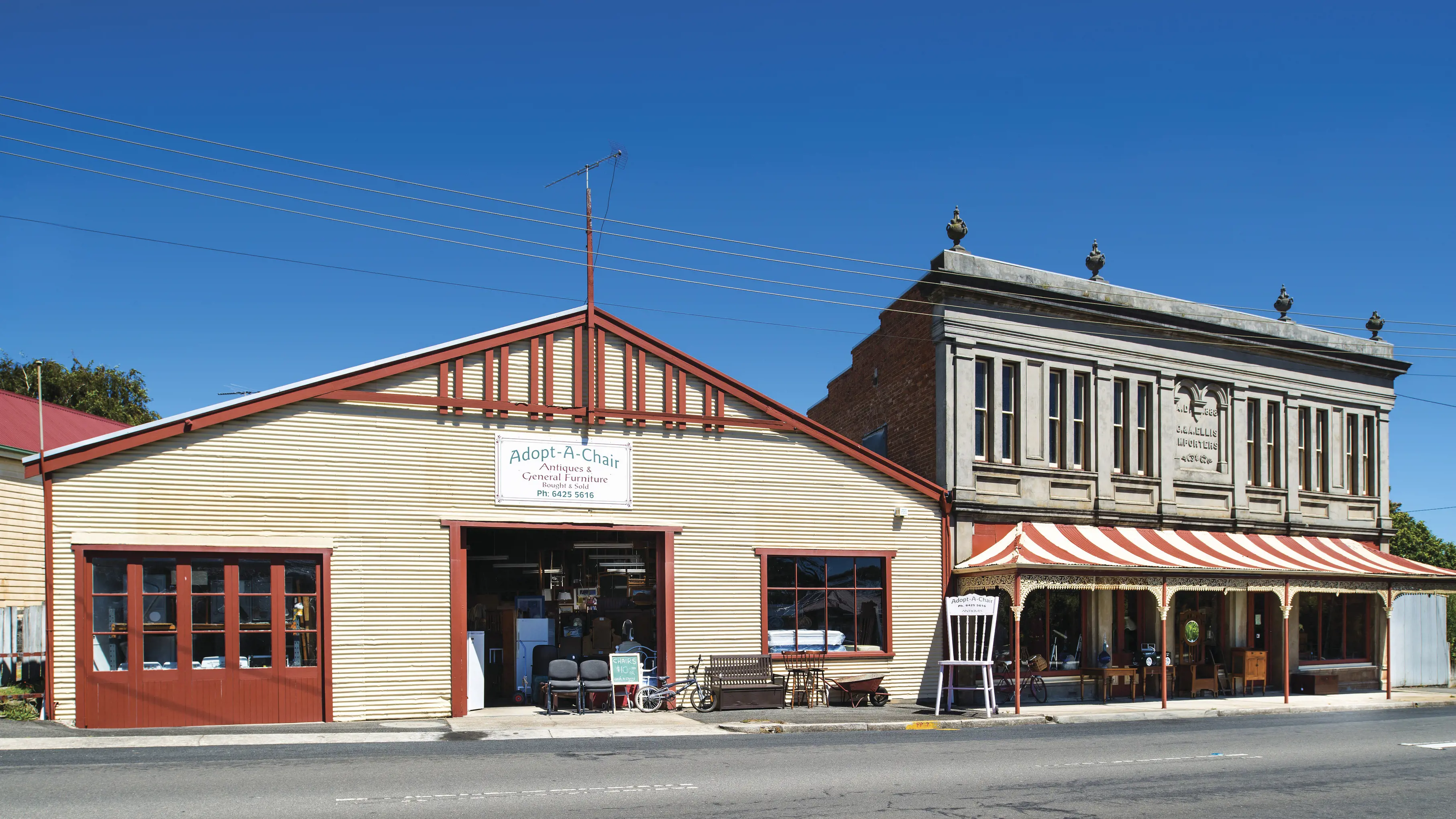 Image taken across the road of the front of the Adopt-A-Chair Store.