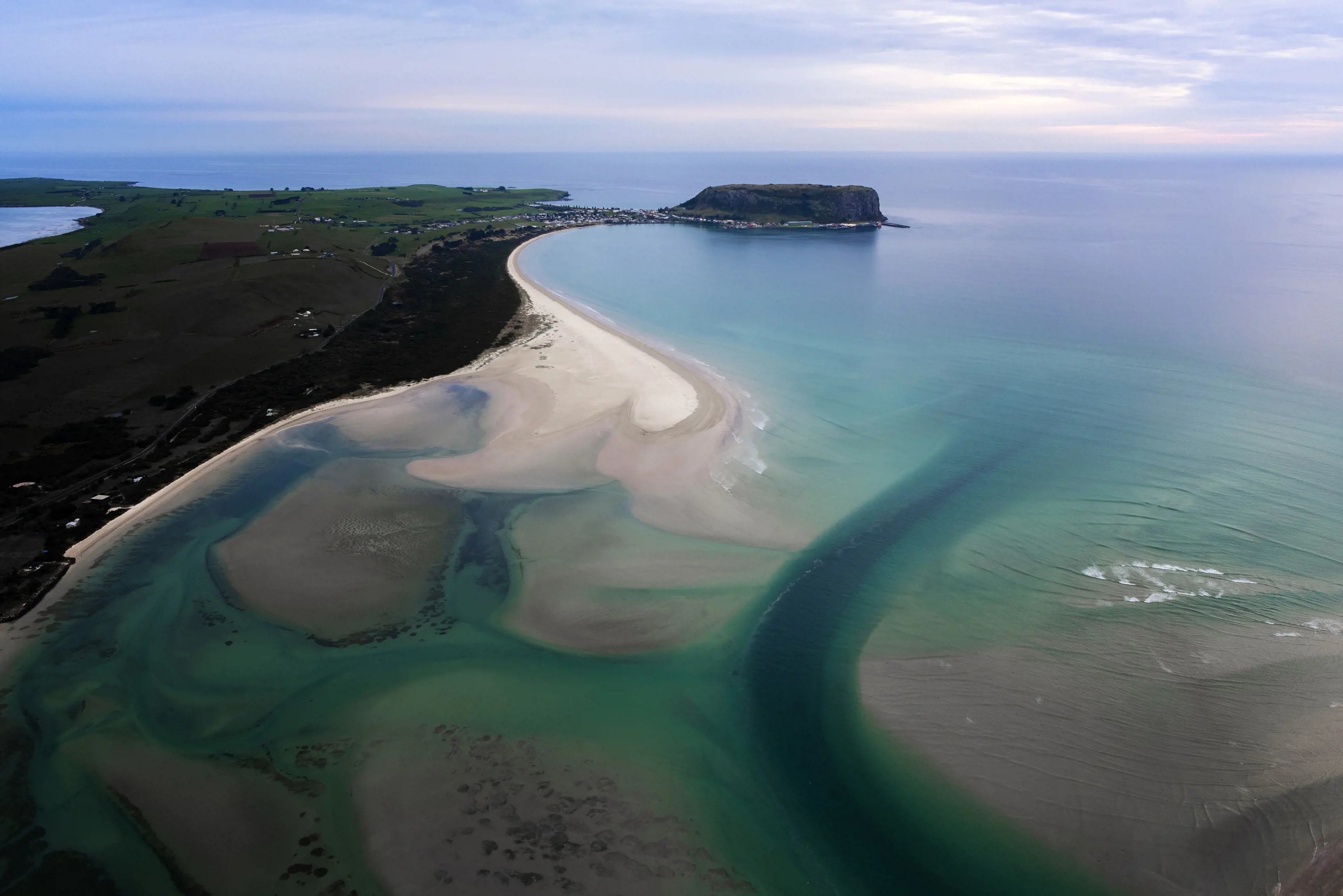 Aerial image of Stanley and the Nut and the nearby sandbanks within the pristine, blue ocean.