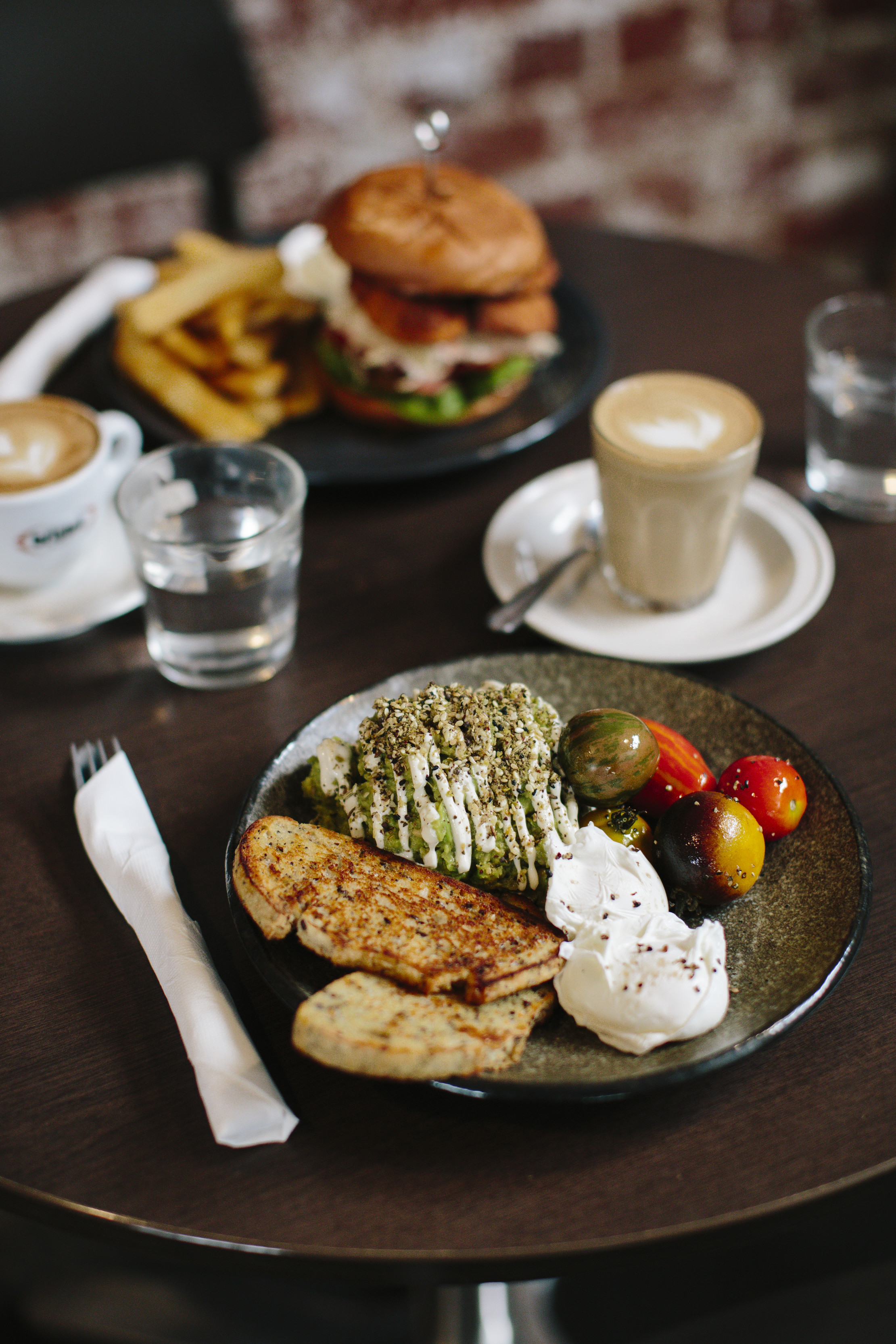 Breakfast, hearty mains & single-origin coffee at Laneway Cafe, a rustic-chic joint with a warm vibe.