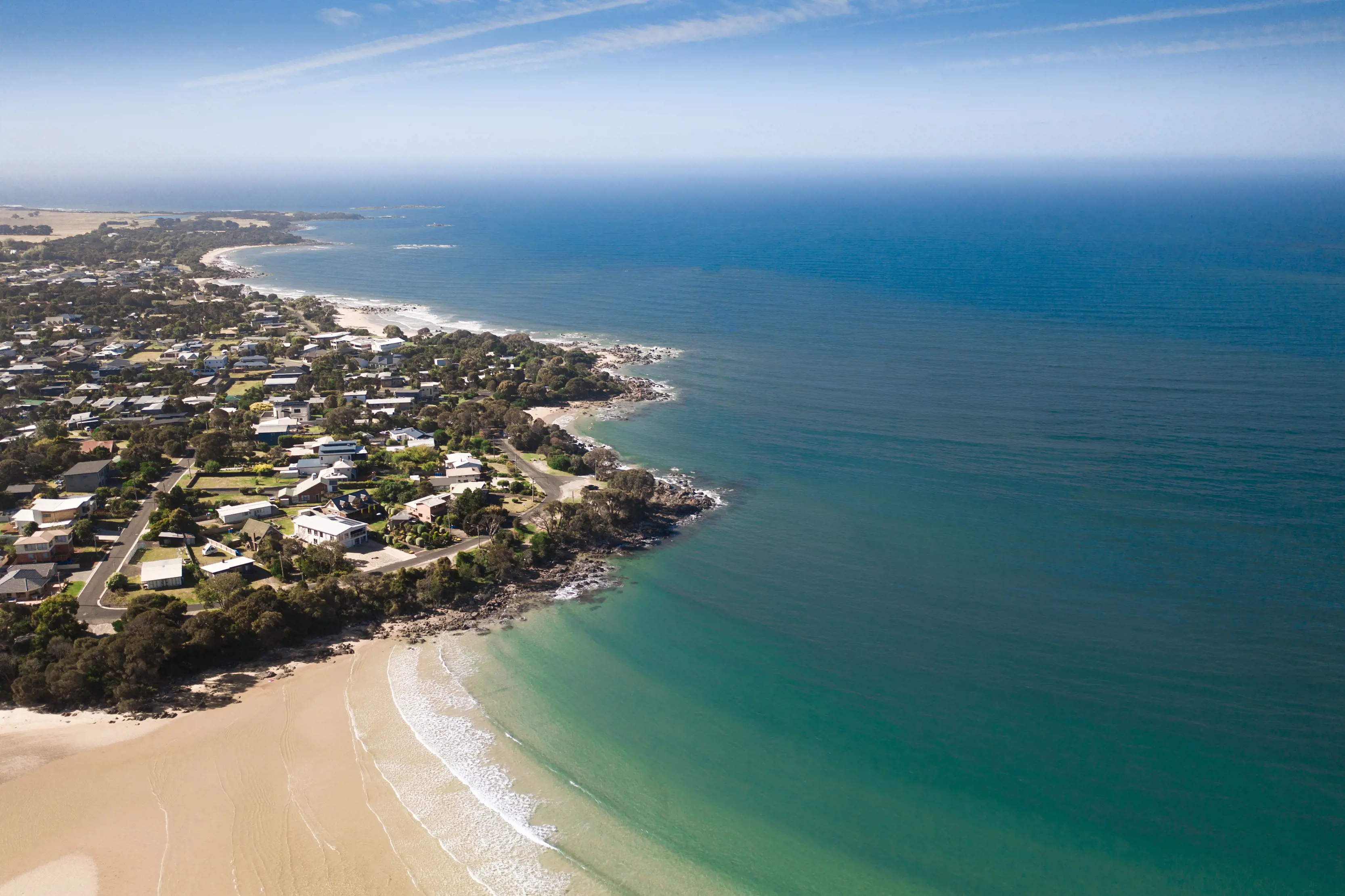 Stunning birds eye view image of Freers and Hawley Beach on a clear, sunny day.