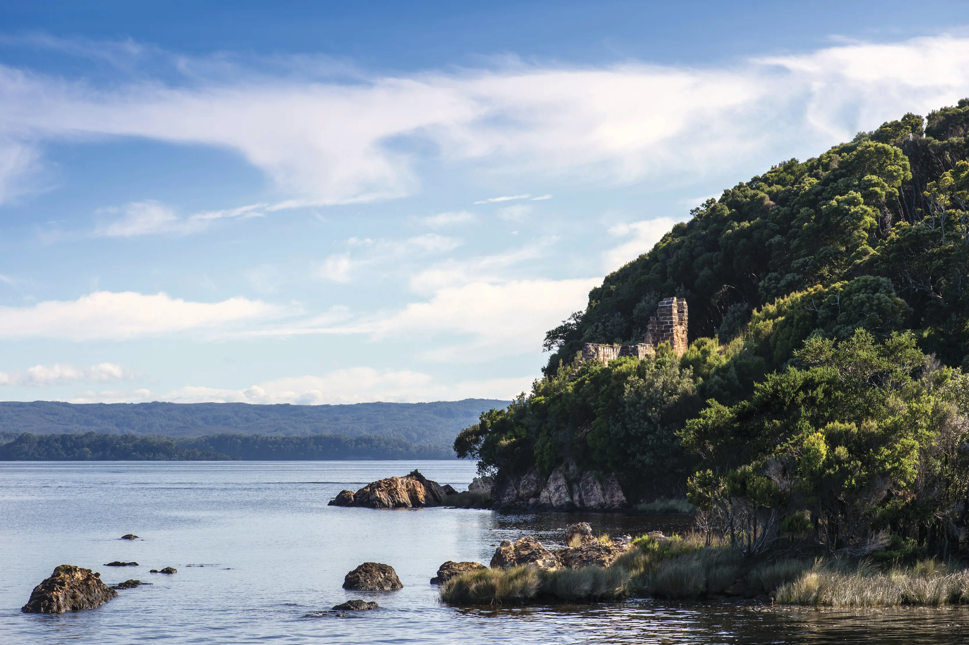 Beautiful landscape image of Sarah Island, lying in the remote reaches of the pristine Macquarie Harbour.