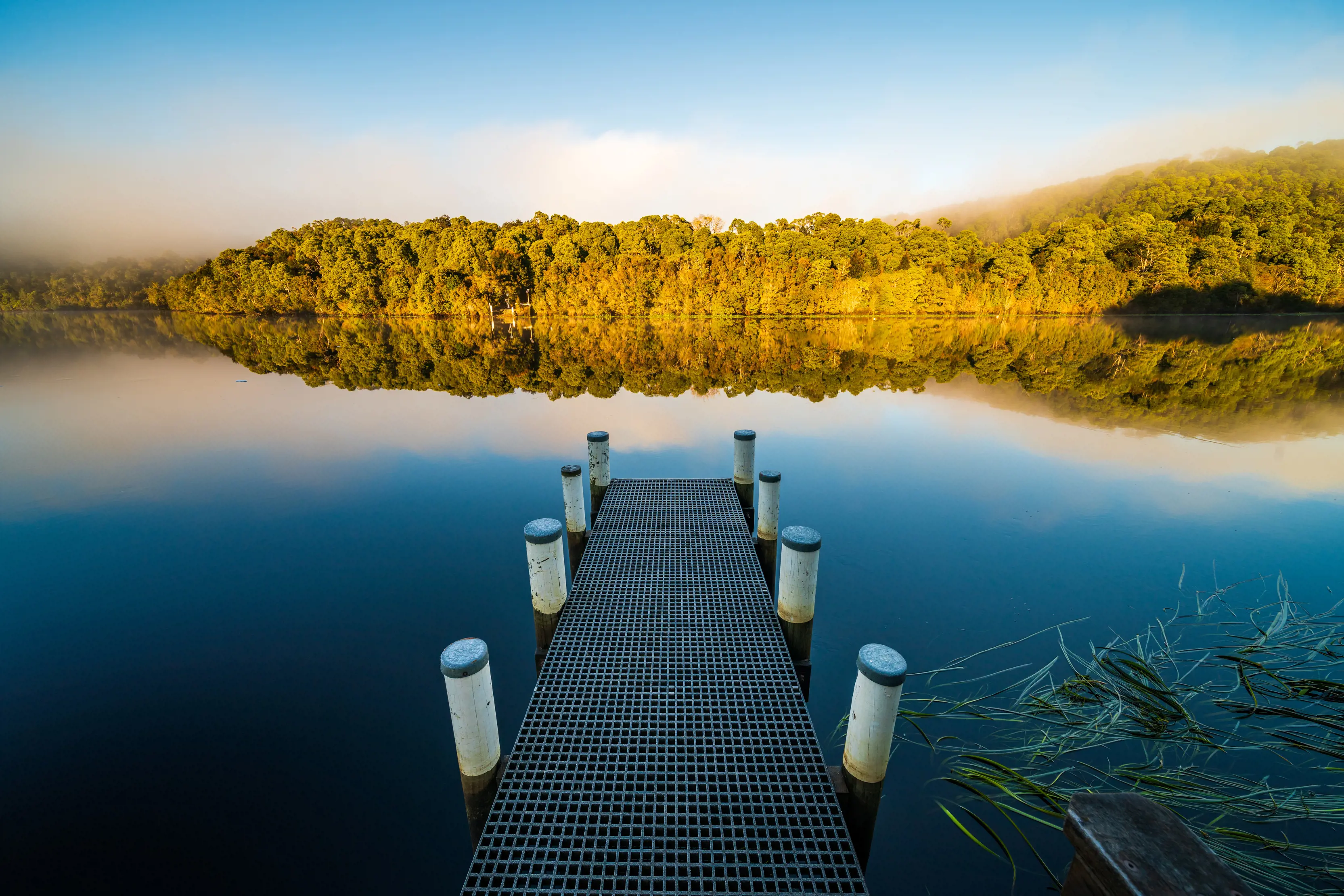 Image of a jetty, floating on the Pieman River.