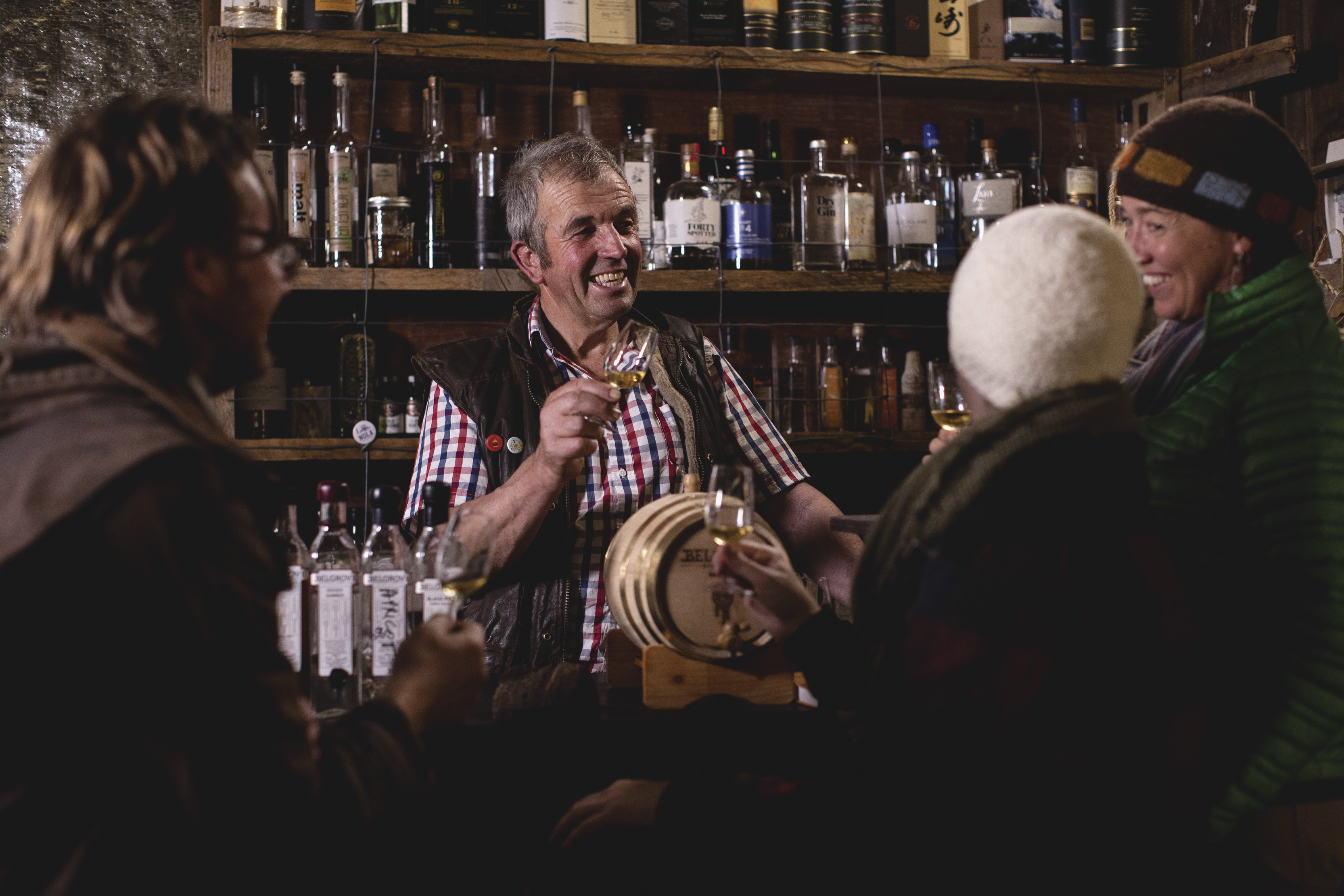 Group of four whisky tasting inside the Belgrove Distillery.