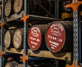 Stacks of barrels taken from an angle inside Hellyers Road Distillery.