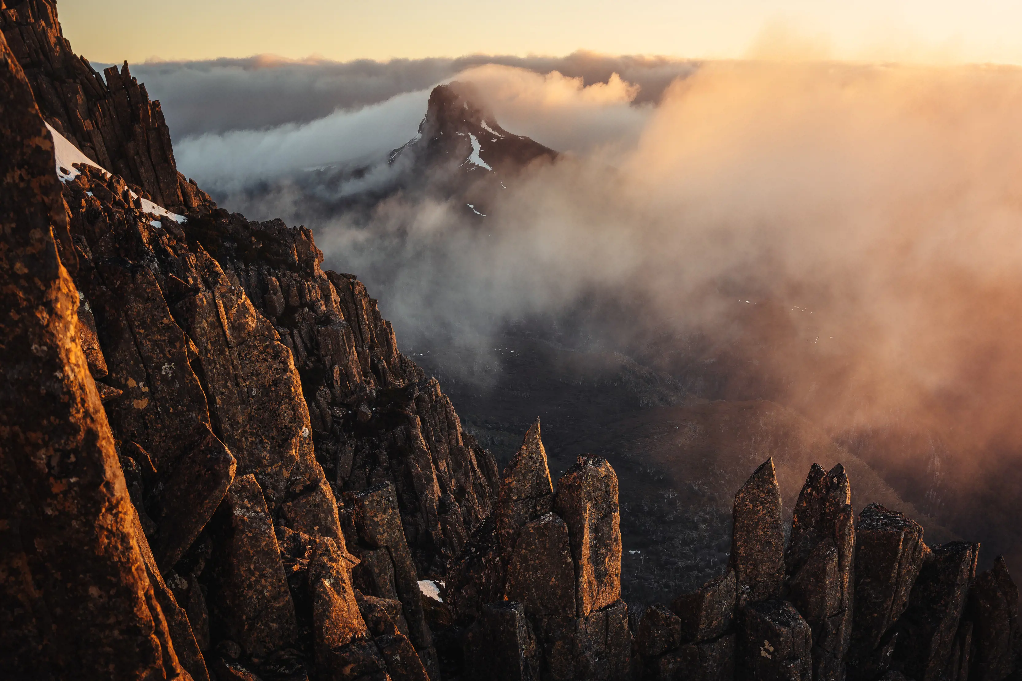 Barn Bluff mountain top covered in clouds at Cradle Mountain, Lake St Clair National Park.